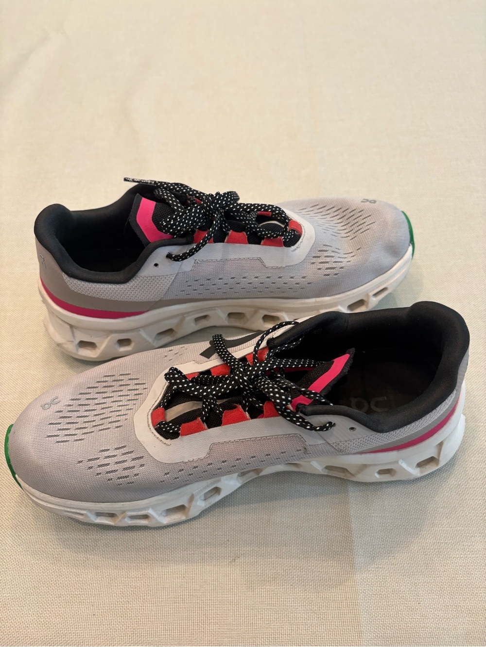 Women's On Cloudmonster sneakers size 9.5 in Silver w/ pink and green accents